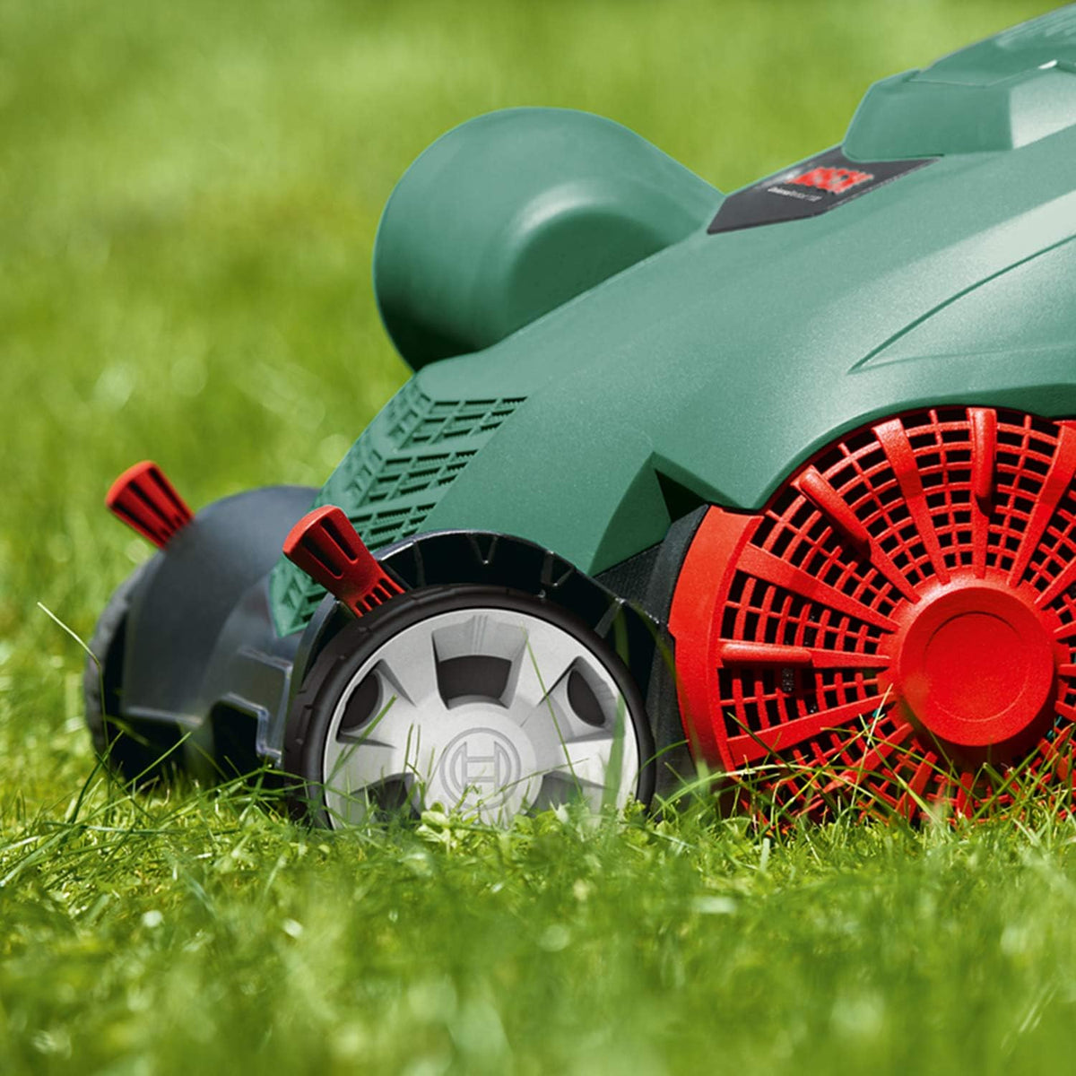 Bosch elektryczny wertykulator UniversalVerticut 1100 (1100 W, szerokość robocza: 32 cm, pojemność pojemnika na odpady: 50 l, w kartonie), nowy design klasyczna zieleń
