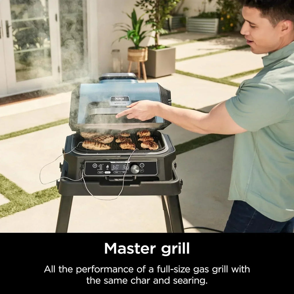 Ninja Woodfire Pro XL Grill i Wędzarnia Zewnętrzna 4 w 1 z Termometrem, Grill Master, Grill Wędzarniczy, Frytkownica Beztłuszczowa Zewnętrzna, Piekarnik, Przenośny, Elektryczny, Ciemnoszary, OG850, 2026